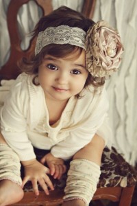 Cute Baby Girl In Cream Dress