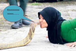 Girl Kissing Snake Photo